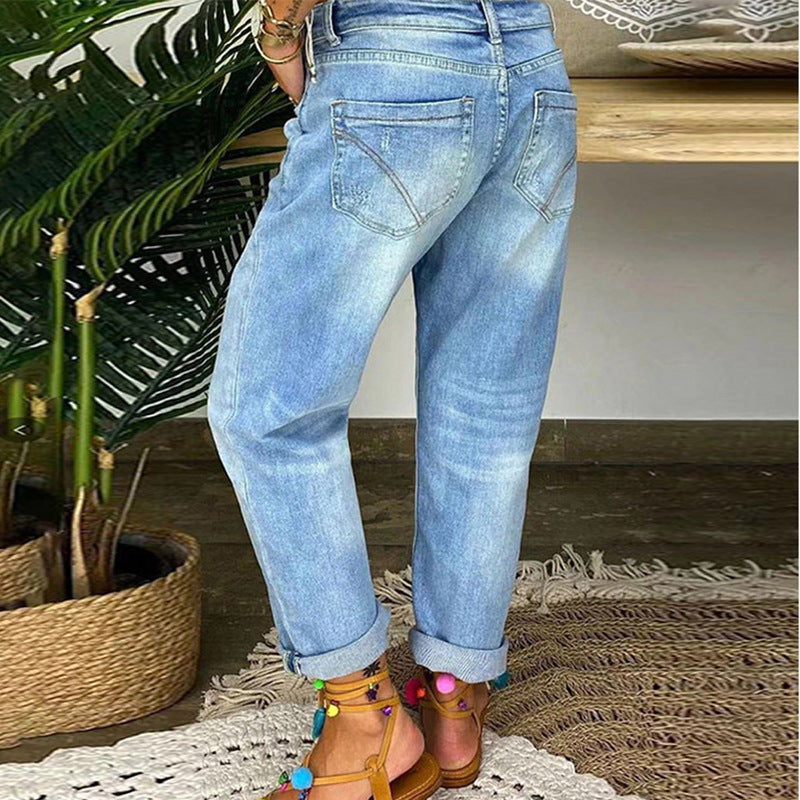 Zerrissene, geknöpfte Jeans mit niedriger Taille