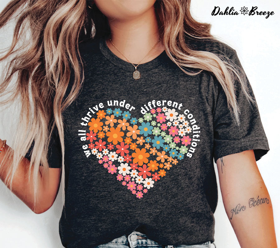Nous prospérons tous dans différentes conditions T-shirt de soutien à l’autisme