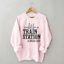 Pourrait être un sweat-shirt un peu de jour à la gare
