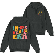 Dans mon sweat à capuche de l’ère de tante