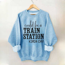 Pourrait être un sweat-shirt un peu de jour à la gare