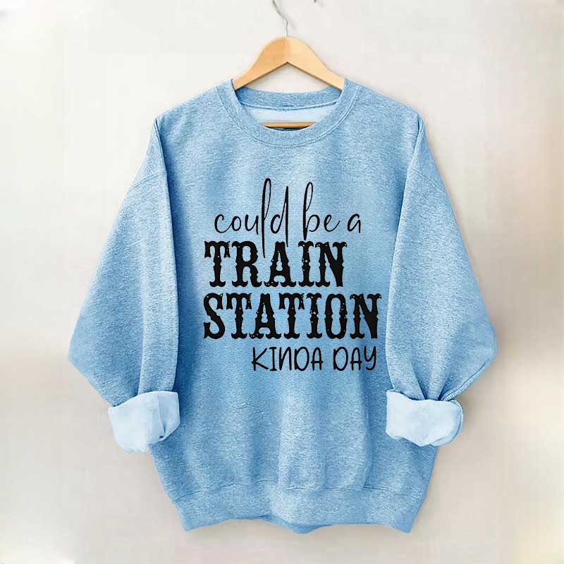 Pourrait être un sweat-shirt un peu de jour à la gare