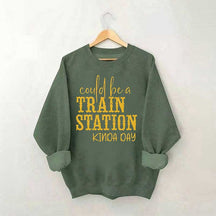 Pourrait être un sweat-shirt un peu de jour à la gare