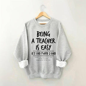 Être enseignant est facile, c'est comme faire du vélo Sweatshirt