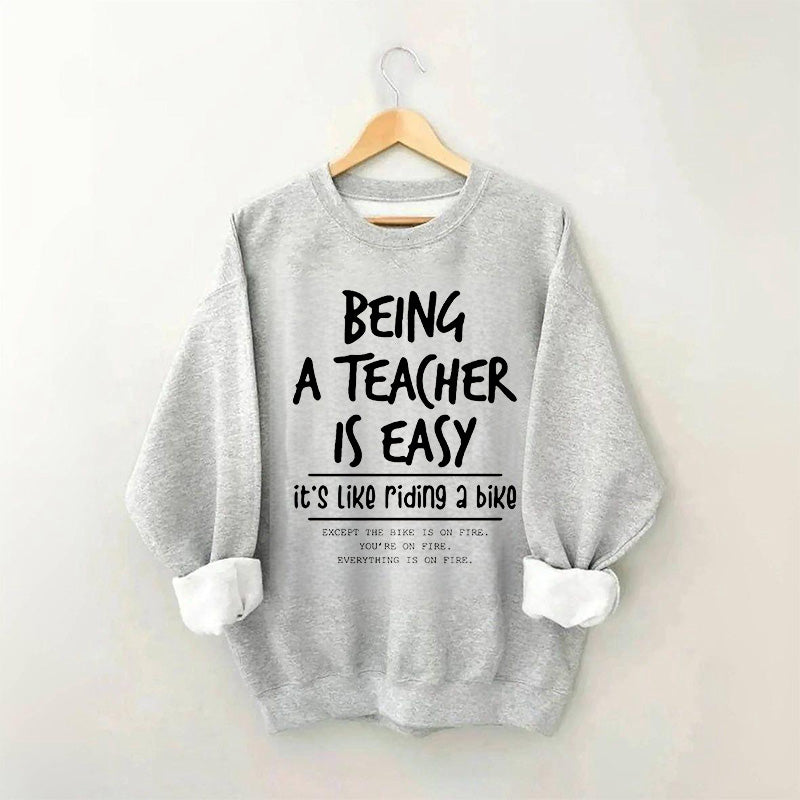 Être enseignant est facile, c'est comme faire du vélo Sweatshirt