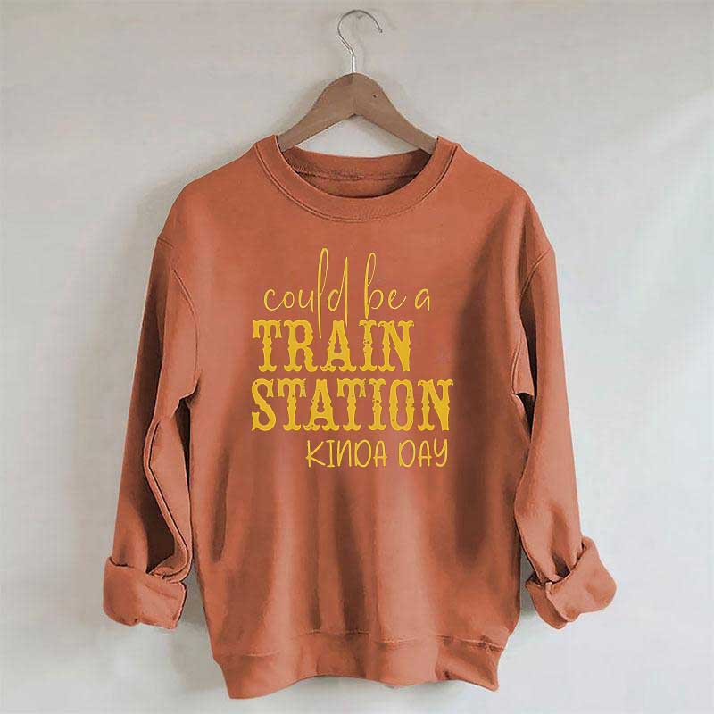 Pourrait être un sweat-shirt un peu de jour à la gare