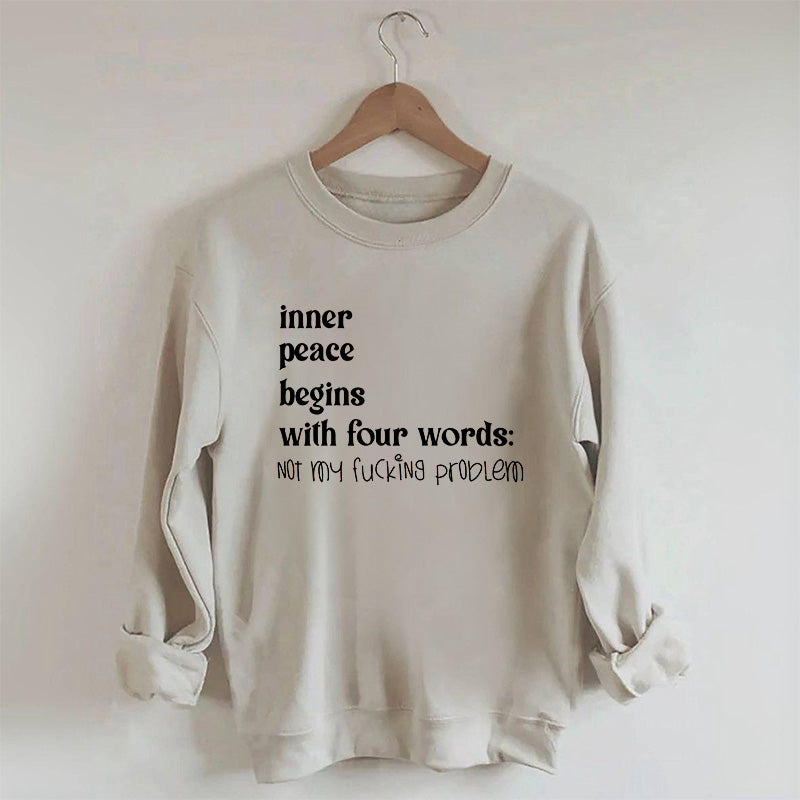 La paix intérieure commence par un sweat-shirt à quatre mots
