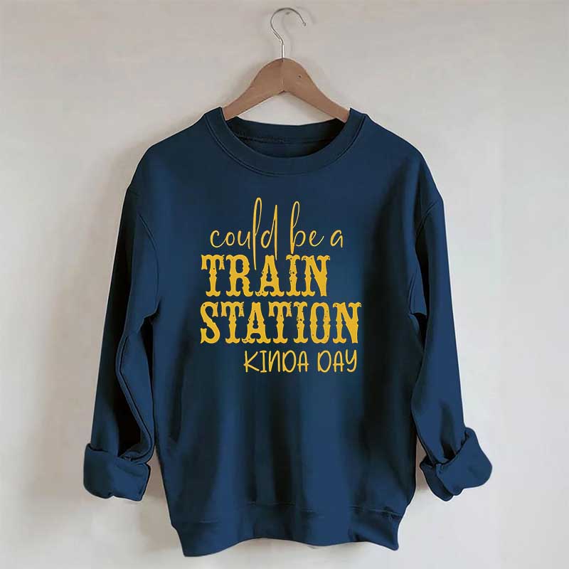 Pourrait être un sweat-shirt un peu de jour à la gare