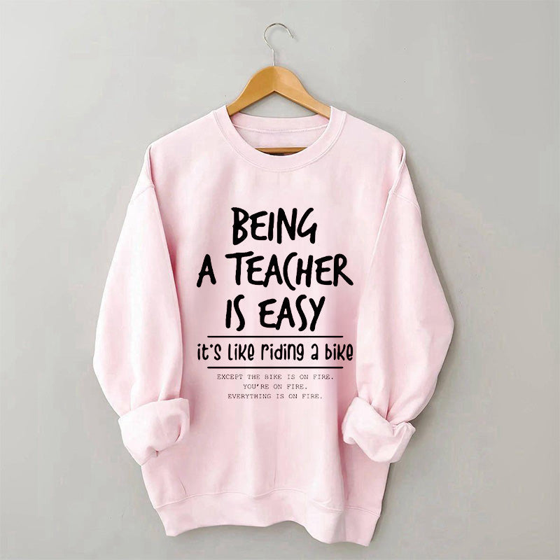 Être enseignant est facile, c'est comme faire du vélo Sweatshirt