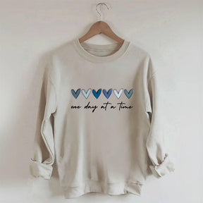 Sweat-shirt Un jour à la fois