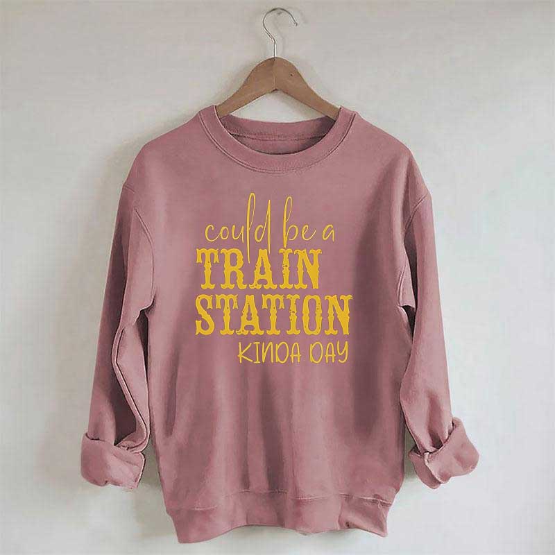 Pourrait être un sweat-shirt un peu de jour à la gare