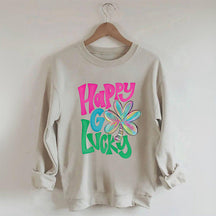 Kleeblatt-Sweatshirt „Happy Go Lucky“.