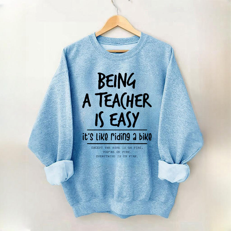 Être enseignant est facile, c'est comme faire du vélo Sweatshirt