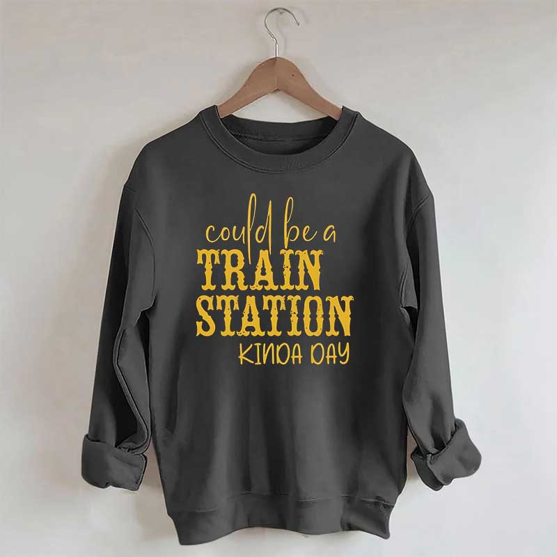 Pourrait être un sweat-shirt un peu de jour à la gare