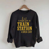 Pourrait être un sweat-shirt un peu de jour à la gare
