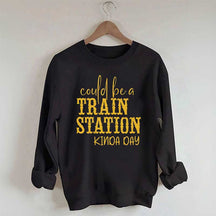 Pourrait être un sweat-shirt un peu de jour à la gare