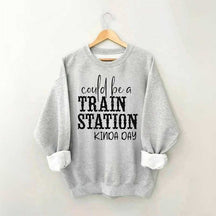 Pourrait être un sweat-shirt un peu de jour à la gare