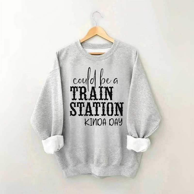 Pourrait être un sweat-shirt un peu de jour à la gare