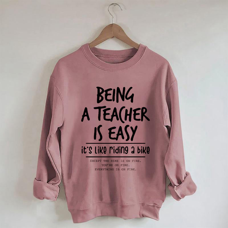 Être enseignant est facile, c'est comme faire du vélo Sweatshirt