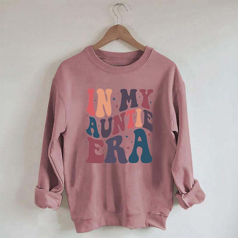 Dans mon sweat-shirt à col rond de l’ère tante