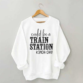 Pourrait être un sweat-shirt un peu de jour à la gare
