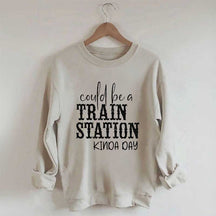 Pourrait être un sweat-shirt un peu de jour à la gare