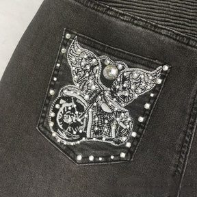 Vintage Slim Jeans mit bestickten Taschen