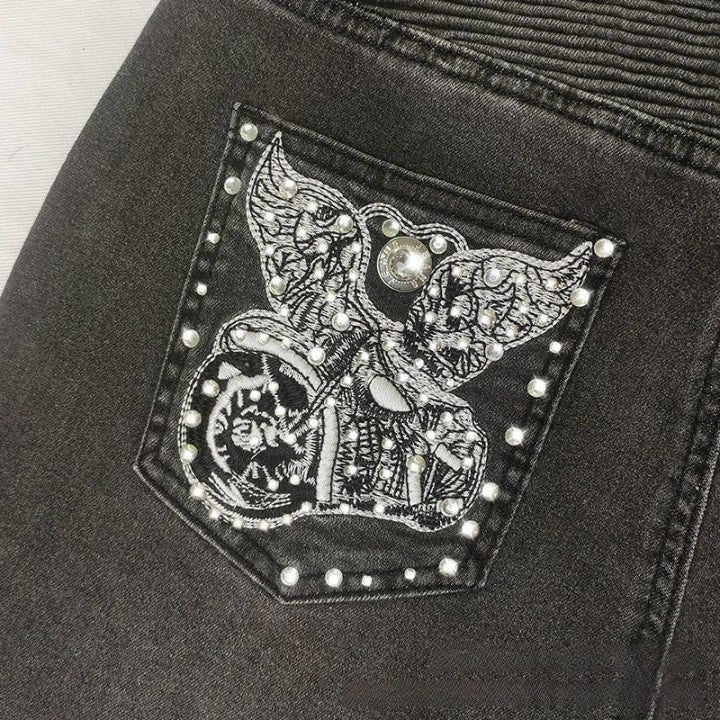 Vintage Slim Jeans mit bestickten Taschen
