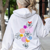 Sweat à capuche Doodle de fleurs aux contours floraux