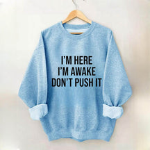 Je suis là, je suis réveillé, ne poussez pas le sweat-shirt
