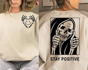 Restez positif avec le sweat squelette
