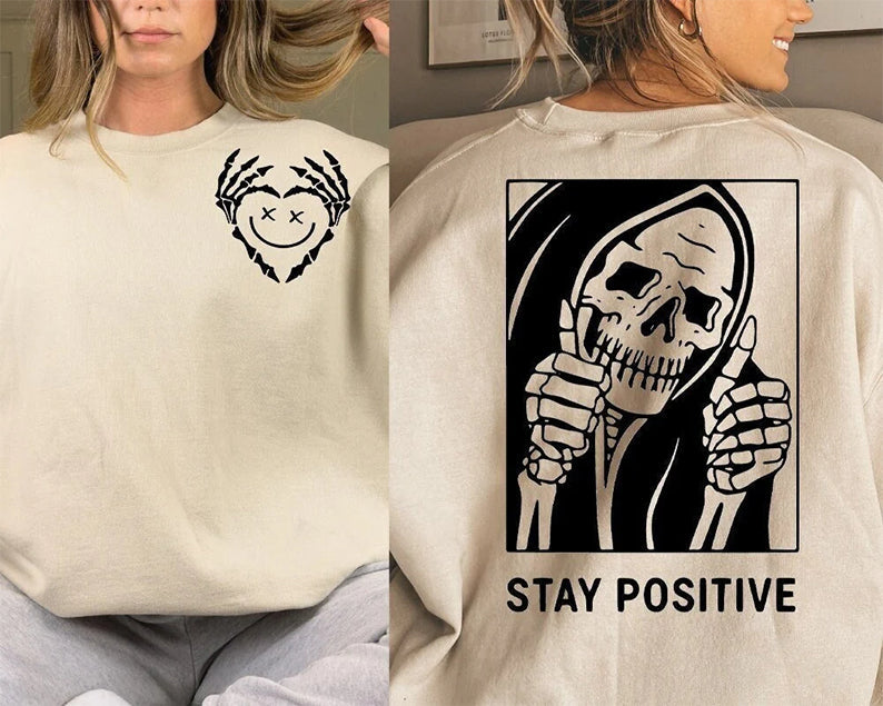 Restez positif avec le sweat squelette