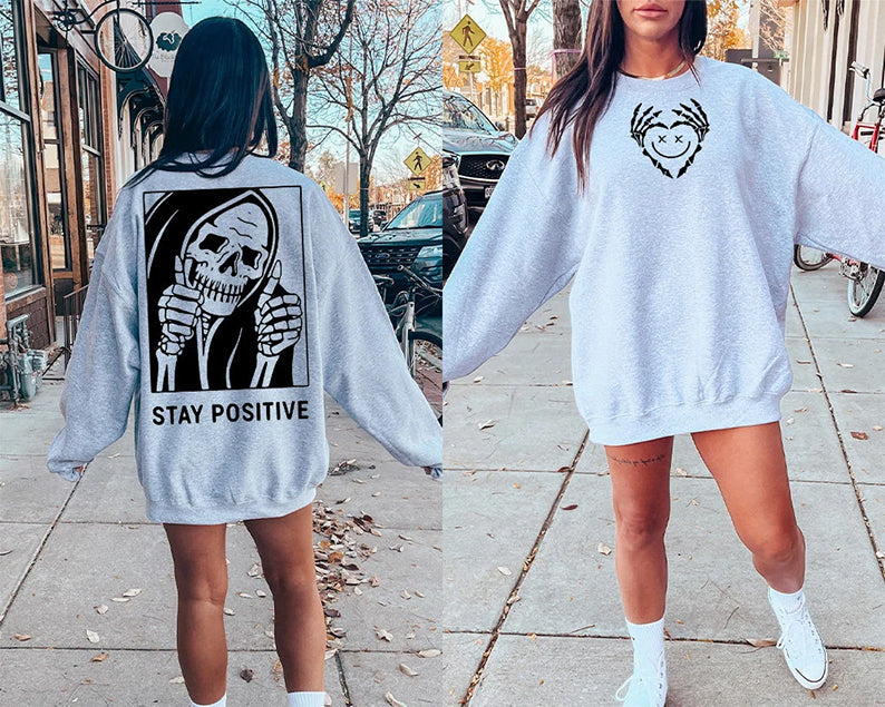 Restez positif avec le sweat squelette