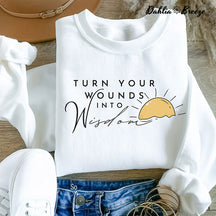 Transformez vos blessures en sweat-shirt de sagesse