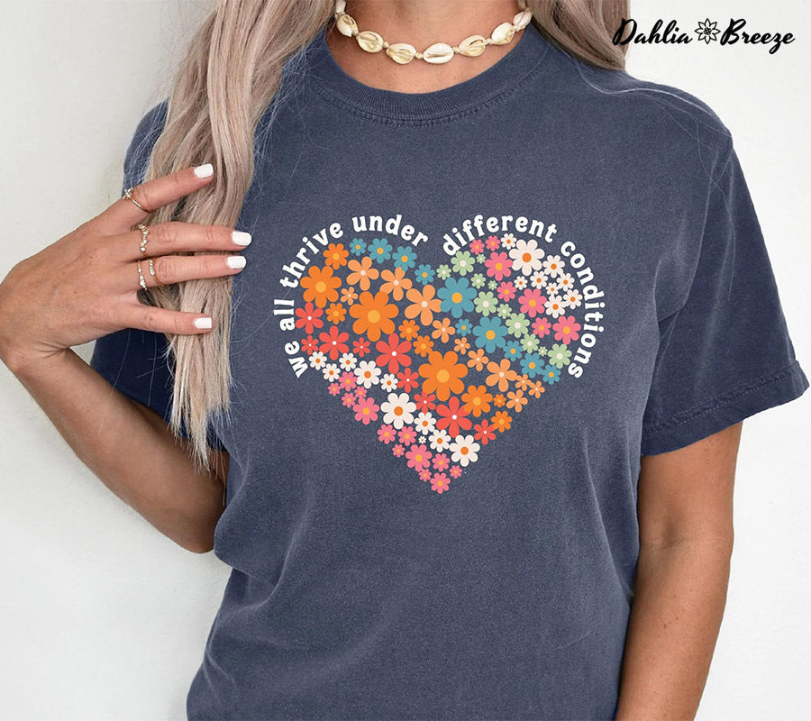 Nous prospérons tous dans différentes conditions T-shirt de soutien à l’autisme