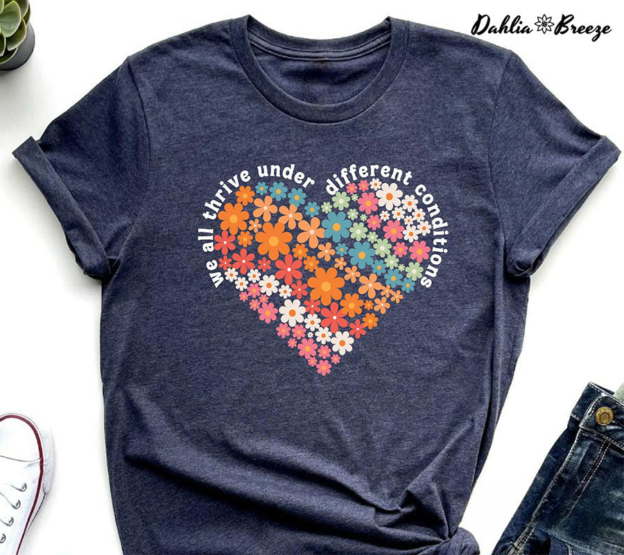 Nous prospérons tous dans différentes conditions T-shirt de soutien à l’autisme