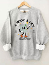 Ein Buch-ein-Tag-Sweatshirt