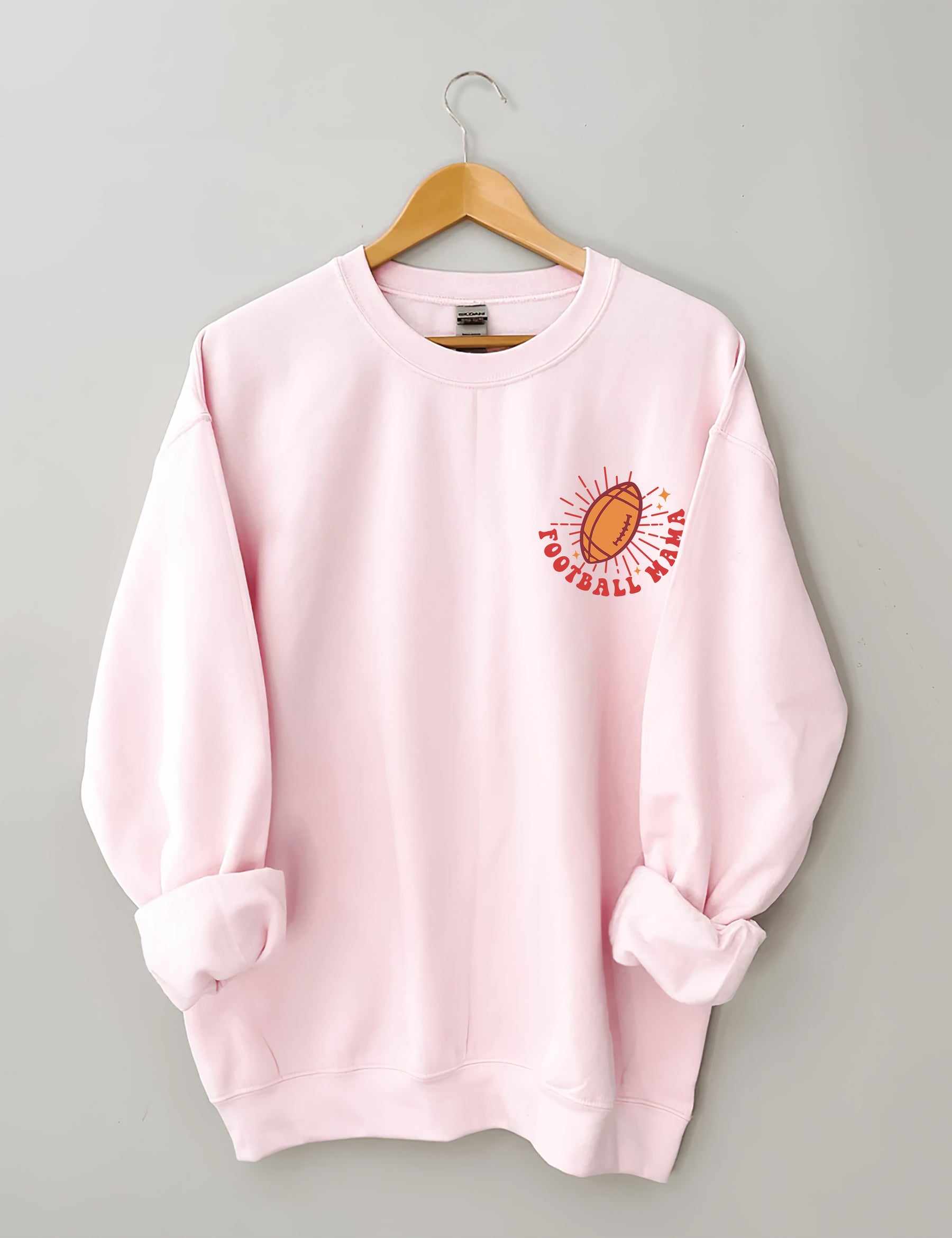 Dans mon sweat-shirt Football Mama Era