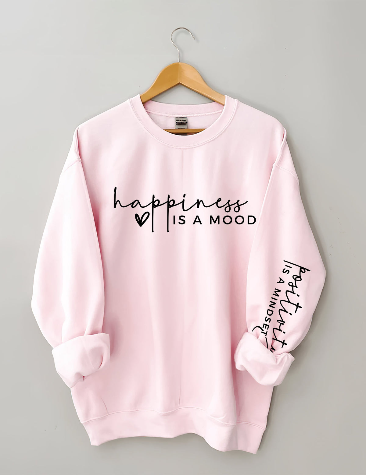 Le bonheur est une humeur, la positivité est un sweat-shirt d’état d’esprit