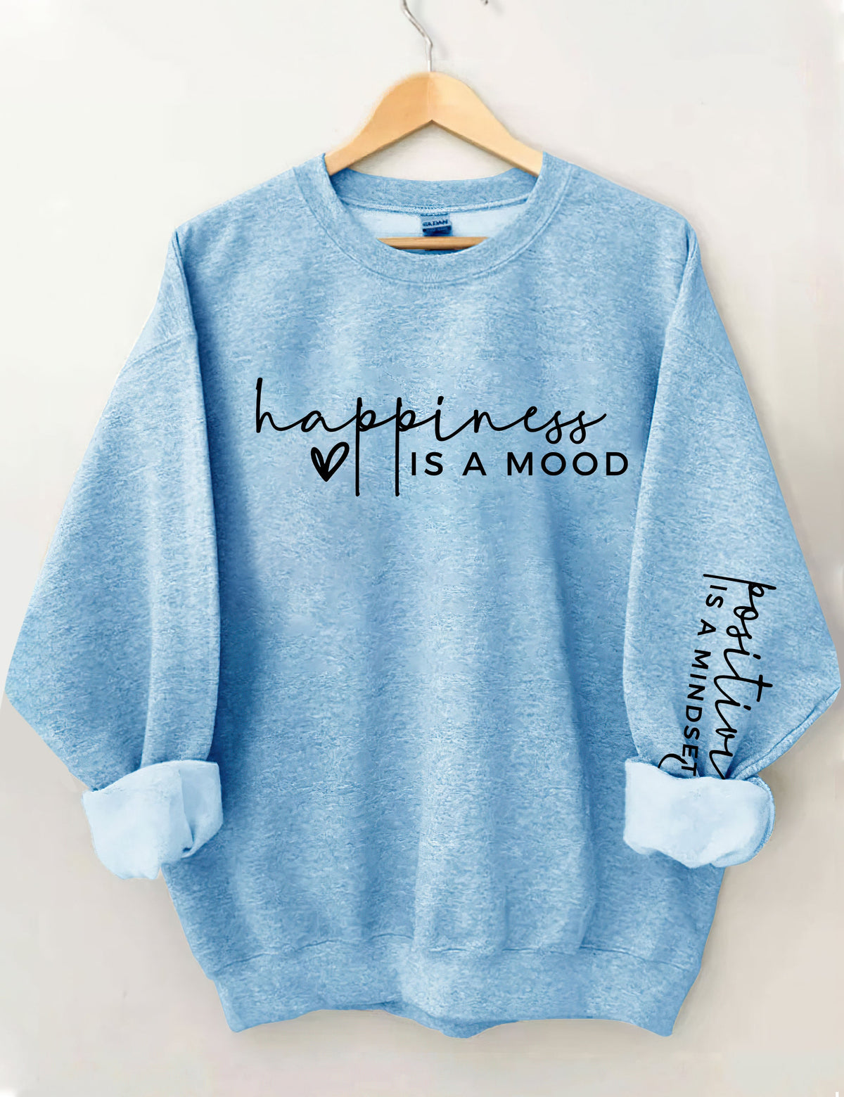 Le bonheur est une humeur, la positivité est un sweat-shirt d’état d’esprit