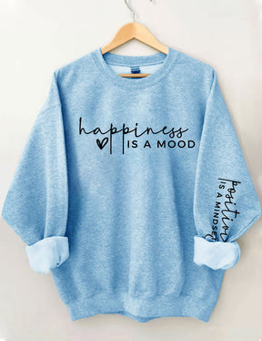 Le bonheur est une humeur, la positivité est un sweat-shirt d’état d’esprit