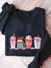 Sweatshirt mit Aufdruck „Valentinstag Kaffeegetränke“.