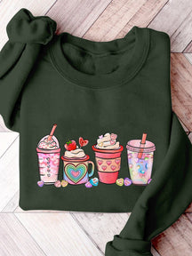 Sweatshirt mit Aufdruck „Valentinstag Kaffeegetränke“.