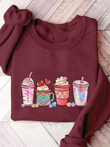 Sweatshirt mit Aufdruck „Valentinstag Kaffeegetränke“.
