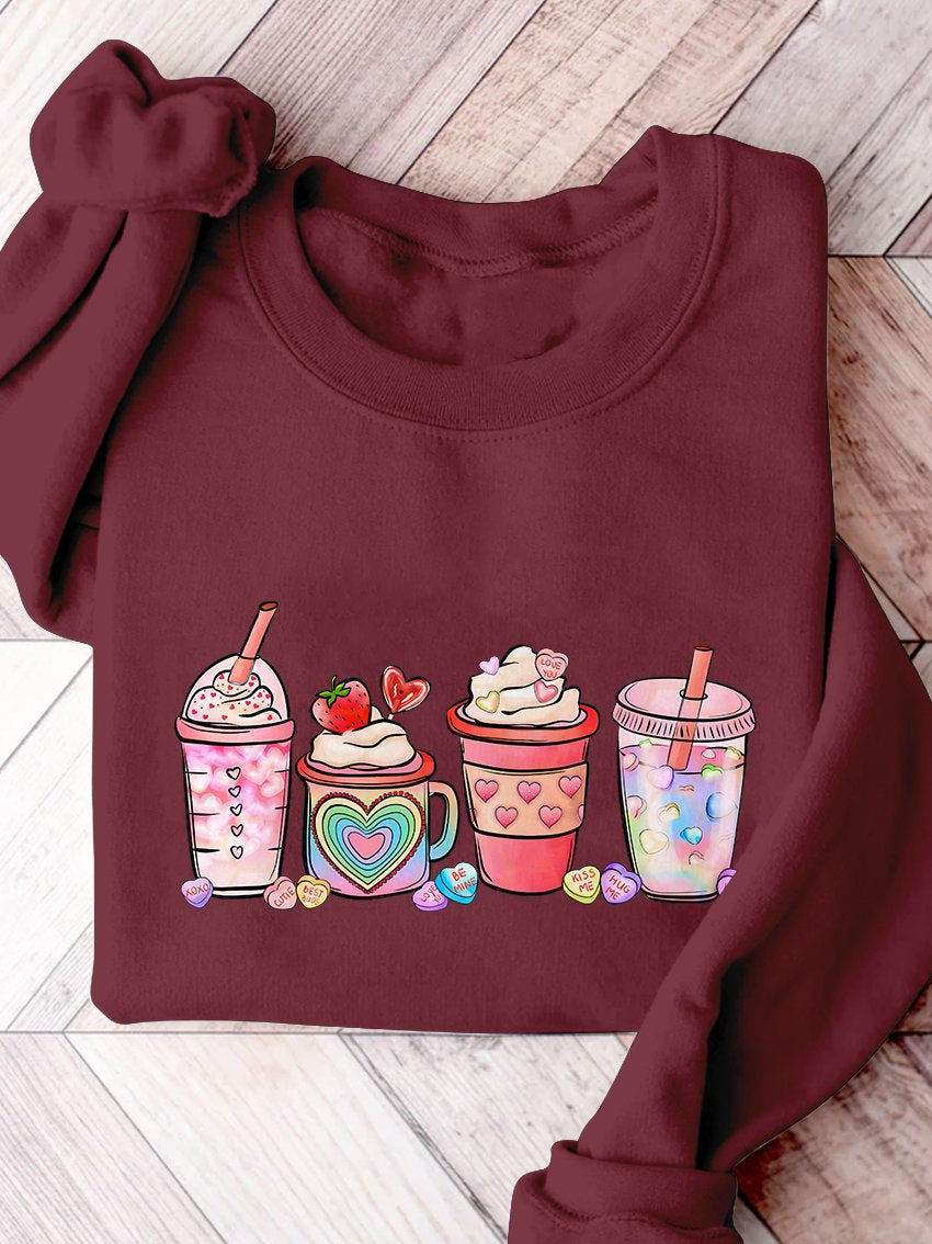 Sweatshirt mit Aufdruck „Valentinstag Kaffeegetränke“.