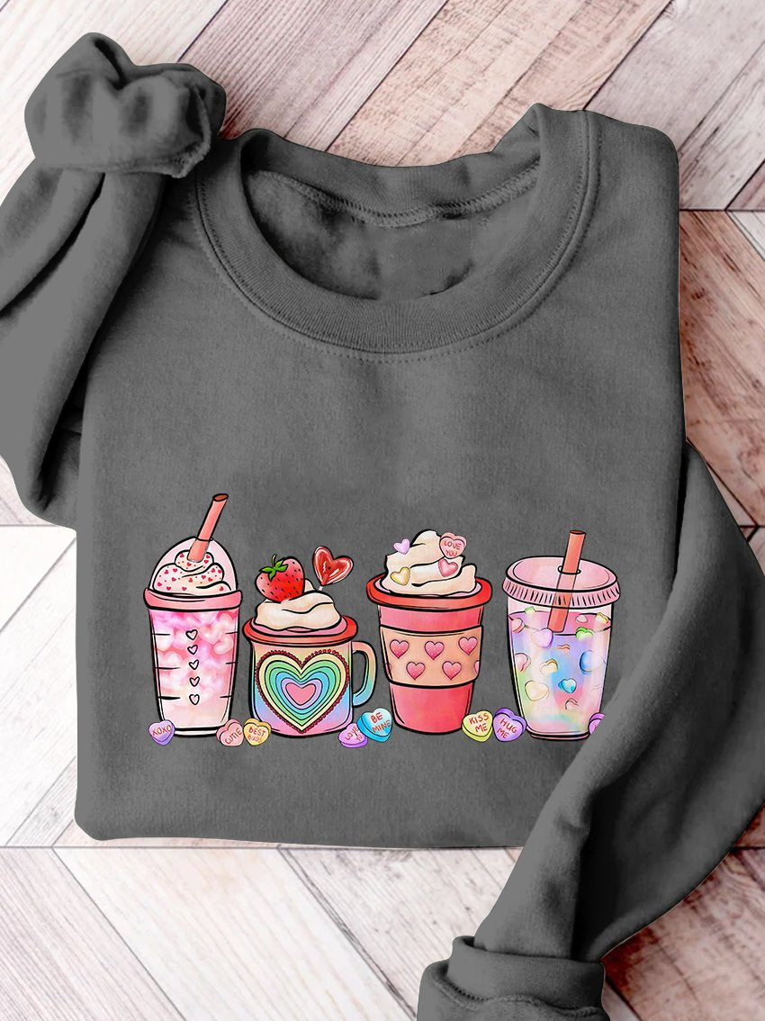 Sweatshirt mit Aufdruck „Valentinstag Kaffeegetränke“.