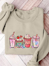 Sweatshirt mit Aufdruck „Valentinstag Kaffeegetränke“.