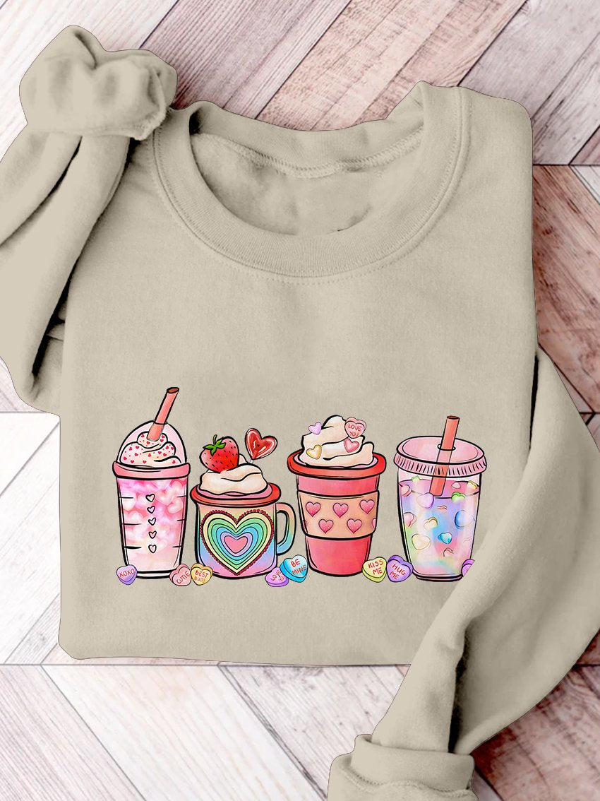 Sweatshirt mit Aufdruck „Valentinstag Kaffeegetränke“.