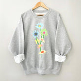 Sweat-shirt à fleurs marguerite